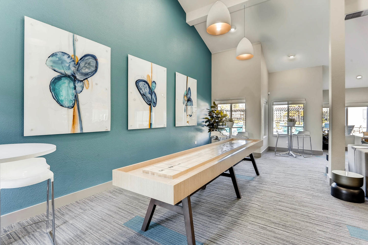 Clubhouse lounge with shuffleboard table