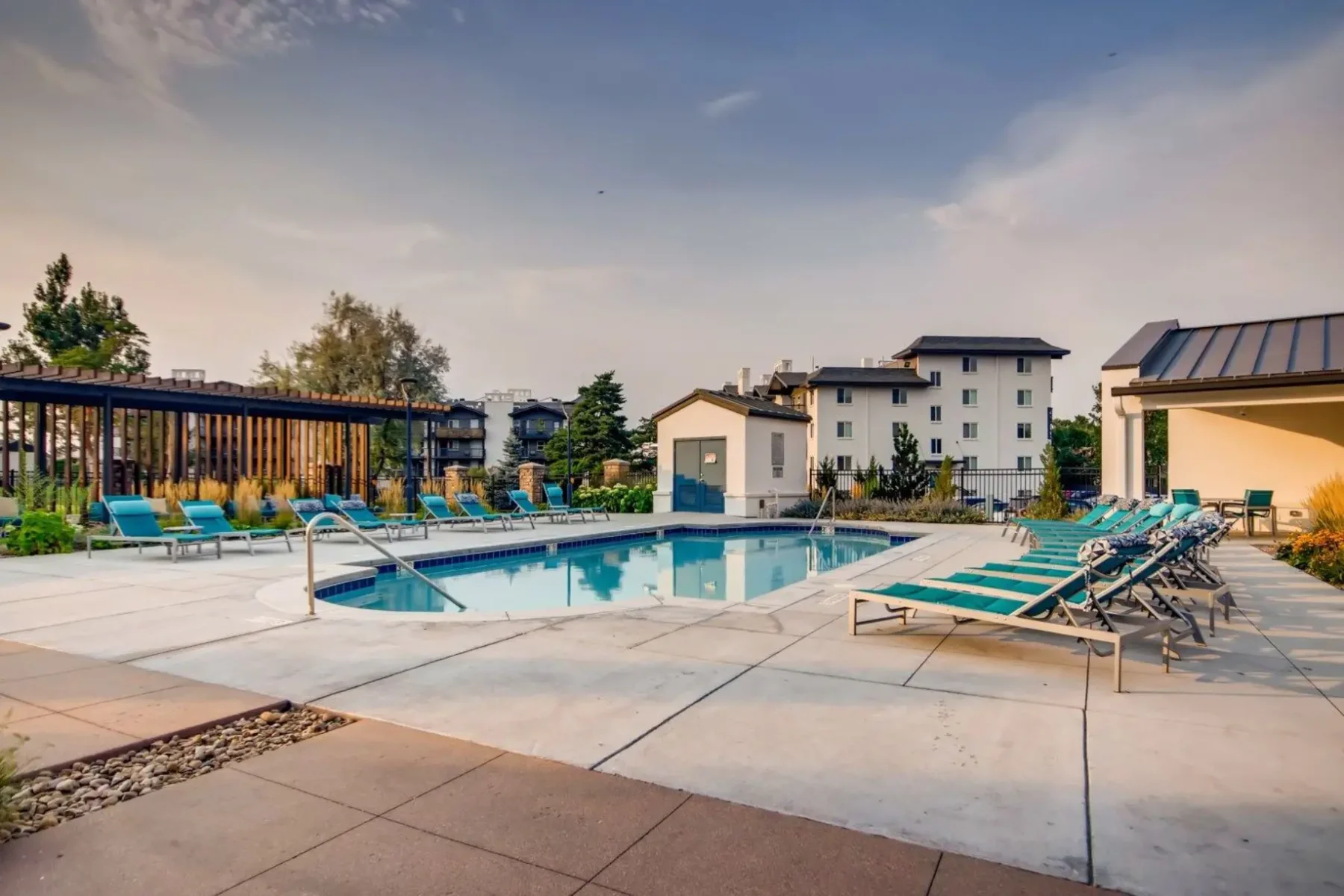 Pool with deck seating and hot tub