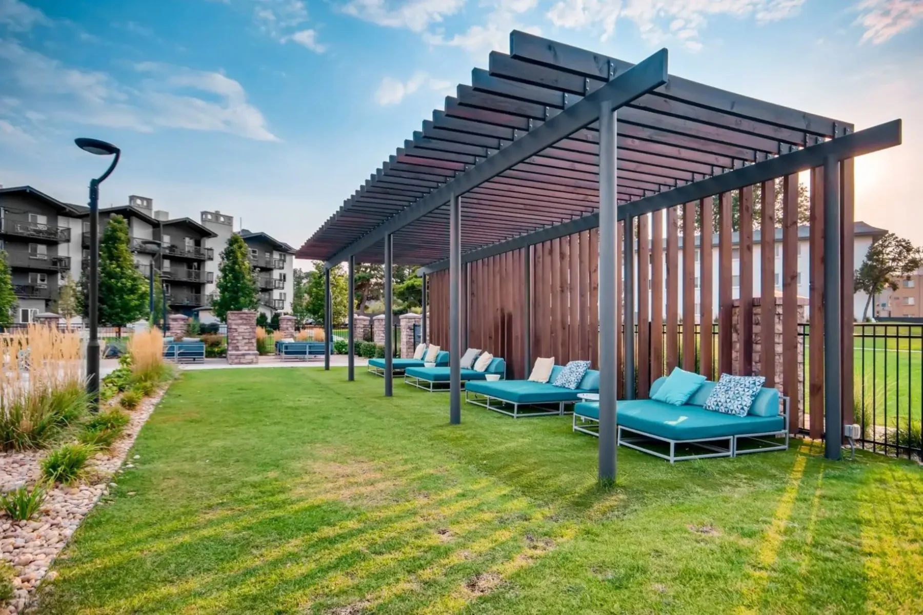 Covered cabanas with day beds by the pool